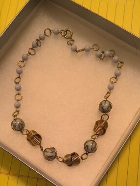 Gold-Tone Necklace with Light Blue Beads and Decorative Wire Spheres
